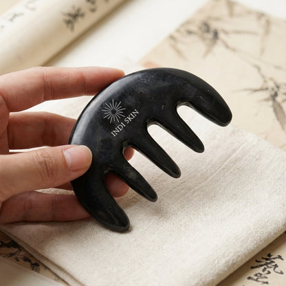 You will be generating high-quality product photos for an online stores product page. The product images should closely match the original products.
      Here is the prompt (IMPORTANT!): """In a minimalist, modern aesthetic scene, showcase the Bian Stone 